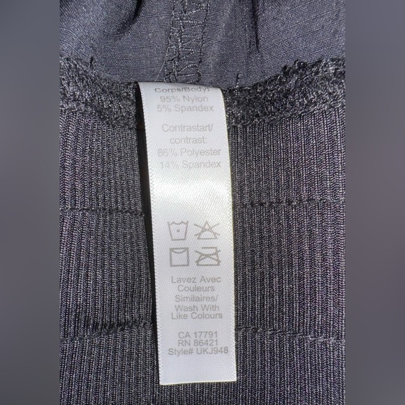 Kyodan Black Activewear shorts. Roll up and snap or leave down. Size L. NWOT - Picture 9 of 9